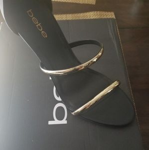 Bebe Sexy Gold and Black Stiletto Sandals